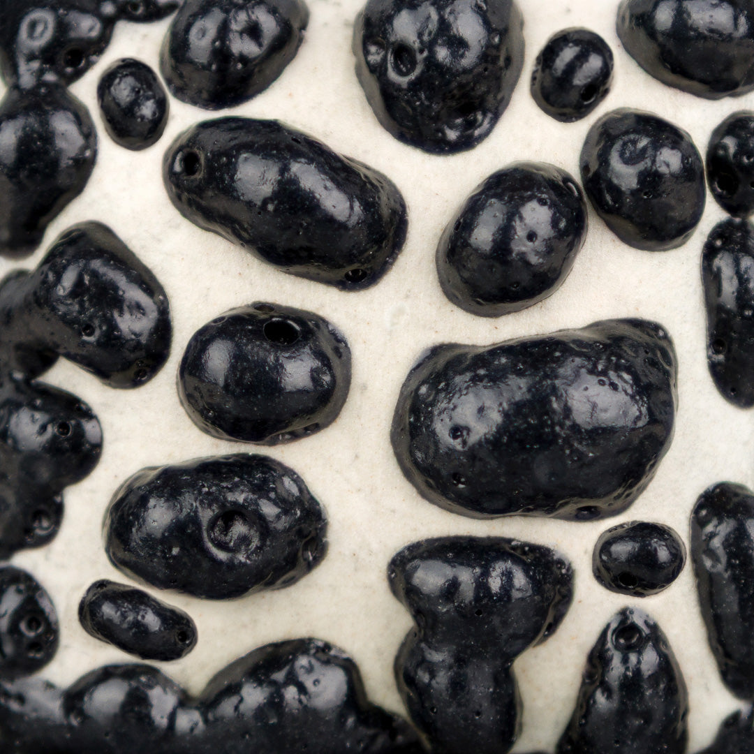 SW465P	Black Moon Rocks