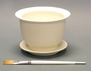 Chesapeake's Bisque Md. Planter w/Drip from Chesapeake Ceramics